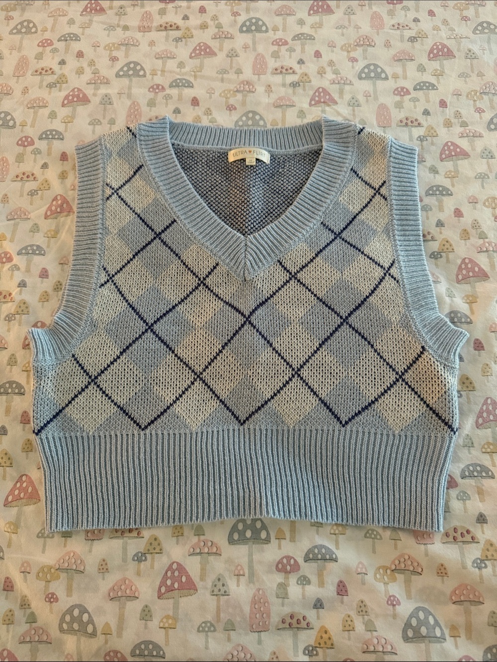 Ultra flirt cropped sweater vest